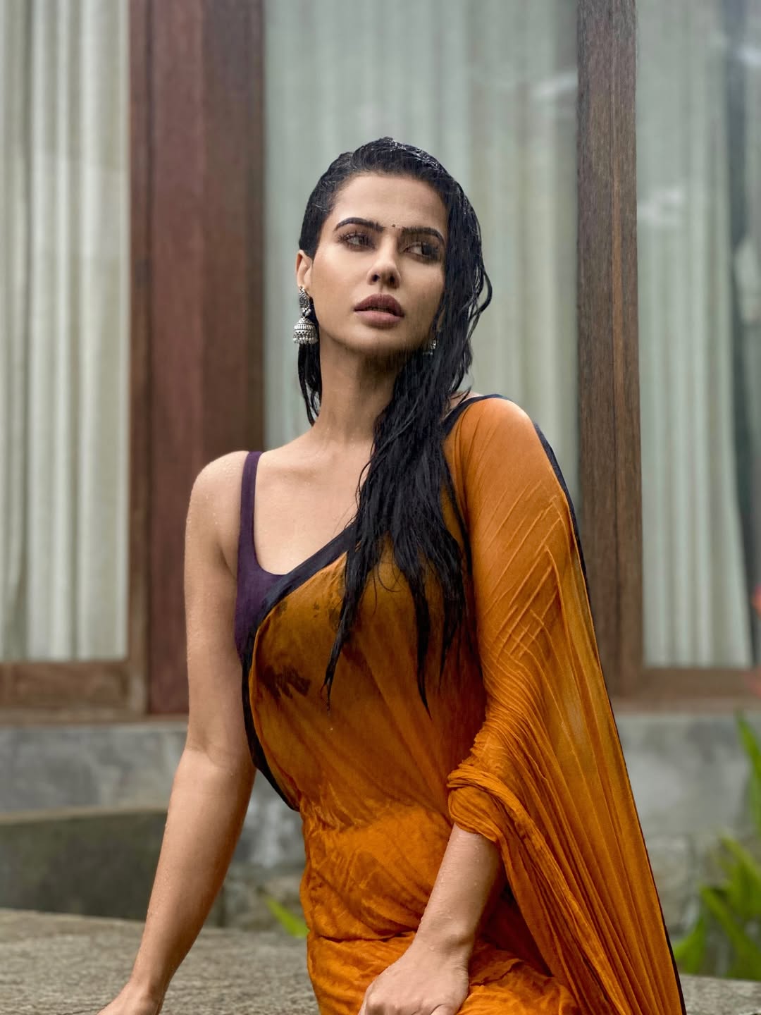 Sharmiela Mandre blending elegance and attitude in rain-kissed style