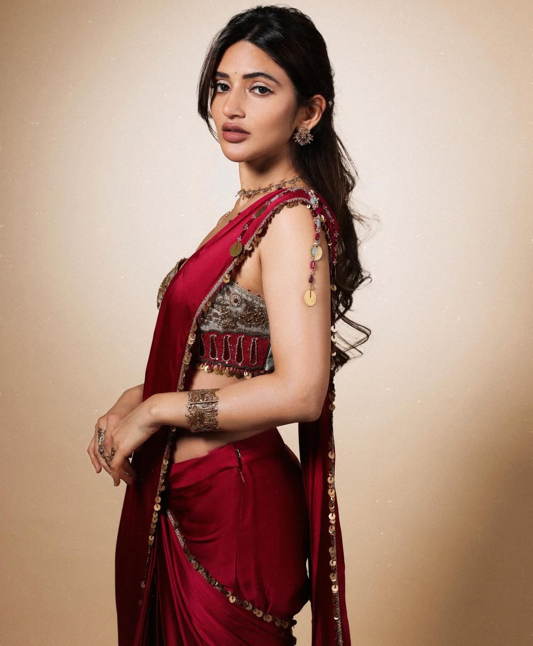 Sreeleela dazzling in gold-touched saree with bold elegance