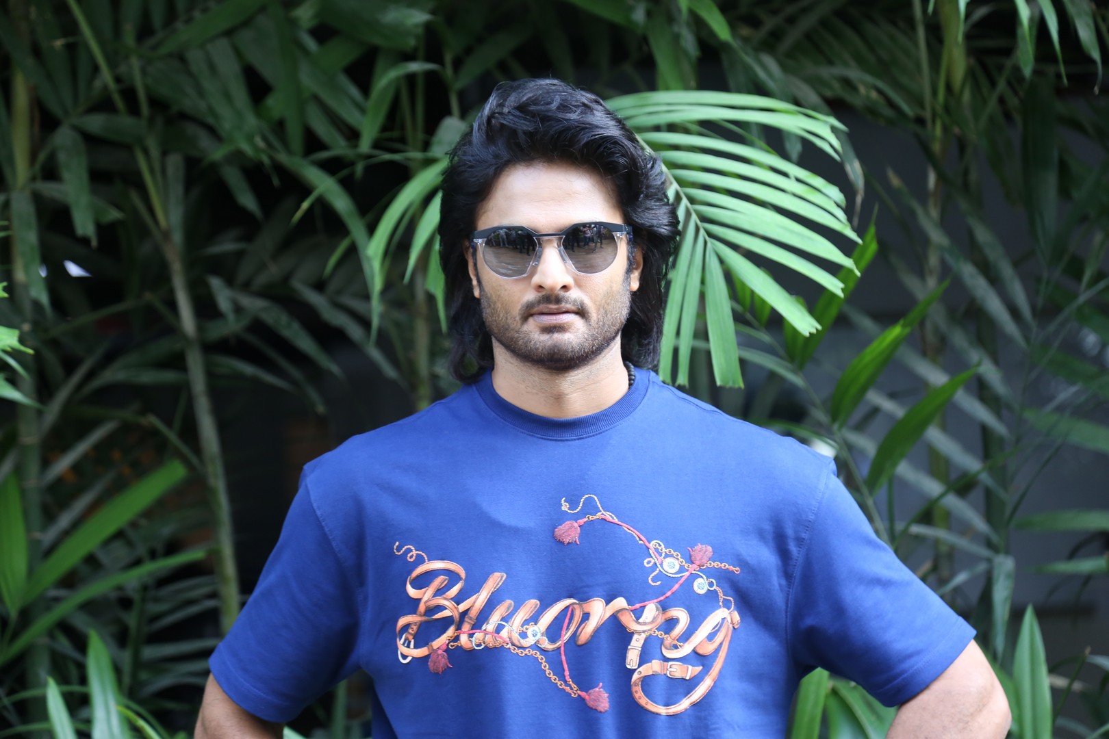 Sudheer Babu in blue tee showing effortless cool style