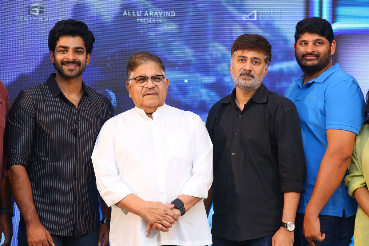Dheekshith Shetty with producers and director posing together