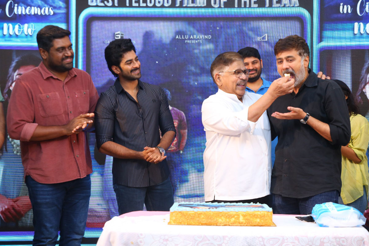 Allu Aravind feeding cake to Rahul Ravindran