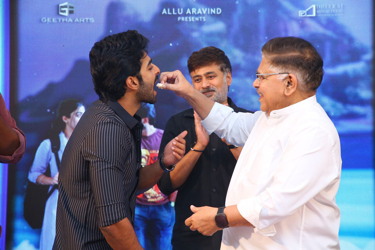 Allu Aravind feeding cake to Dheekshith Shetty
