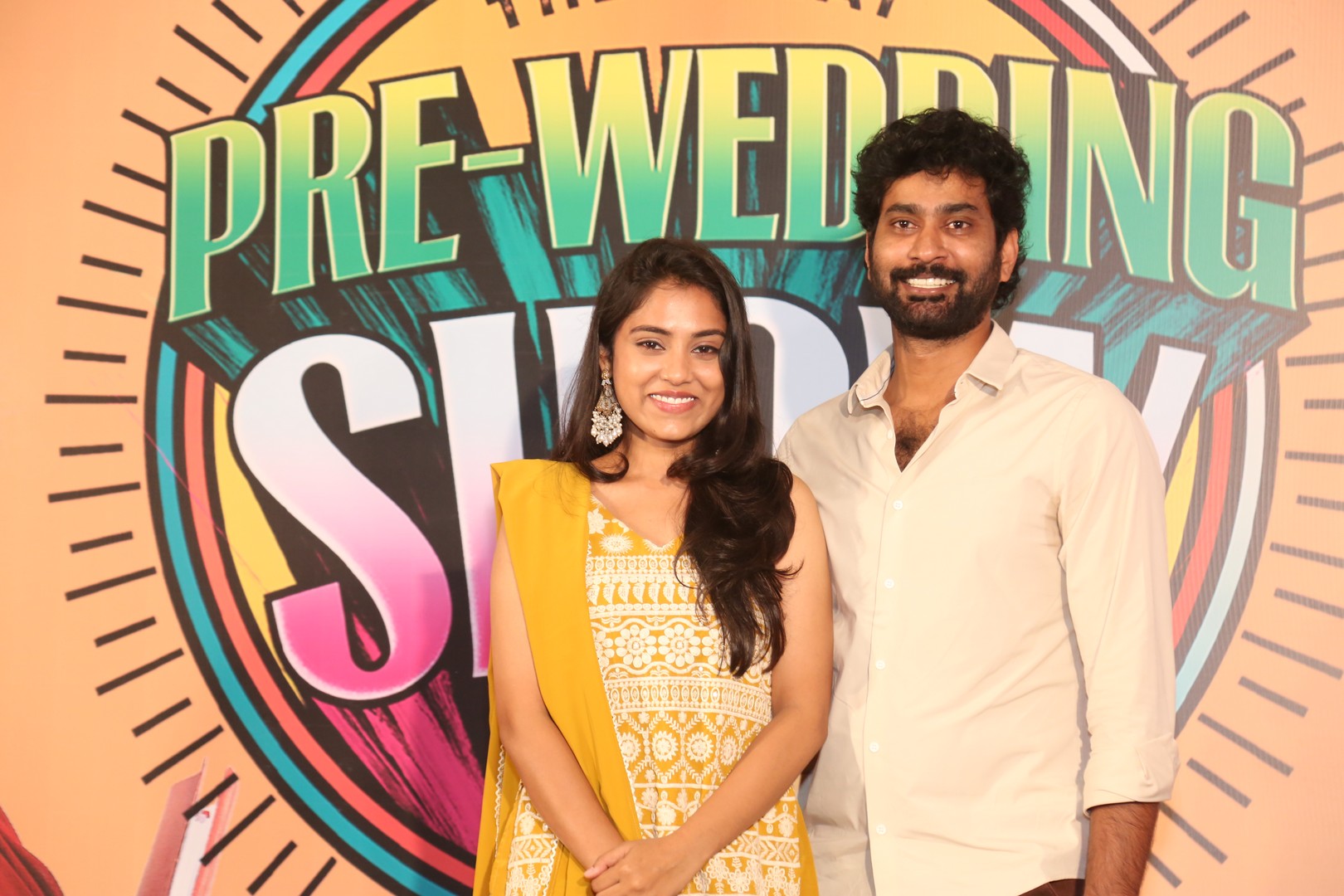 Teena Sravya and Thiruveer smiling at event