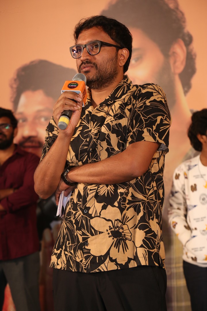 Suresh Bobilli giving speech at event