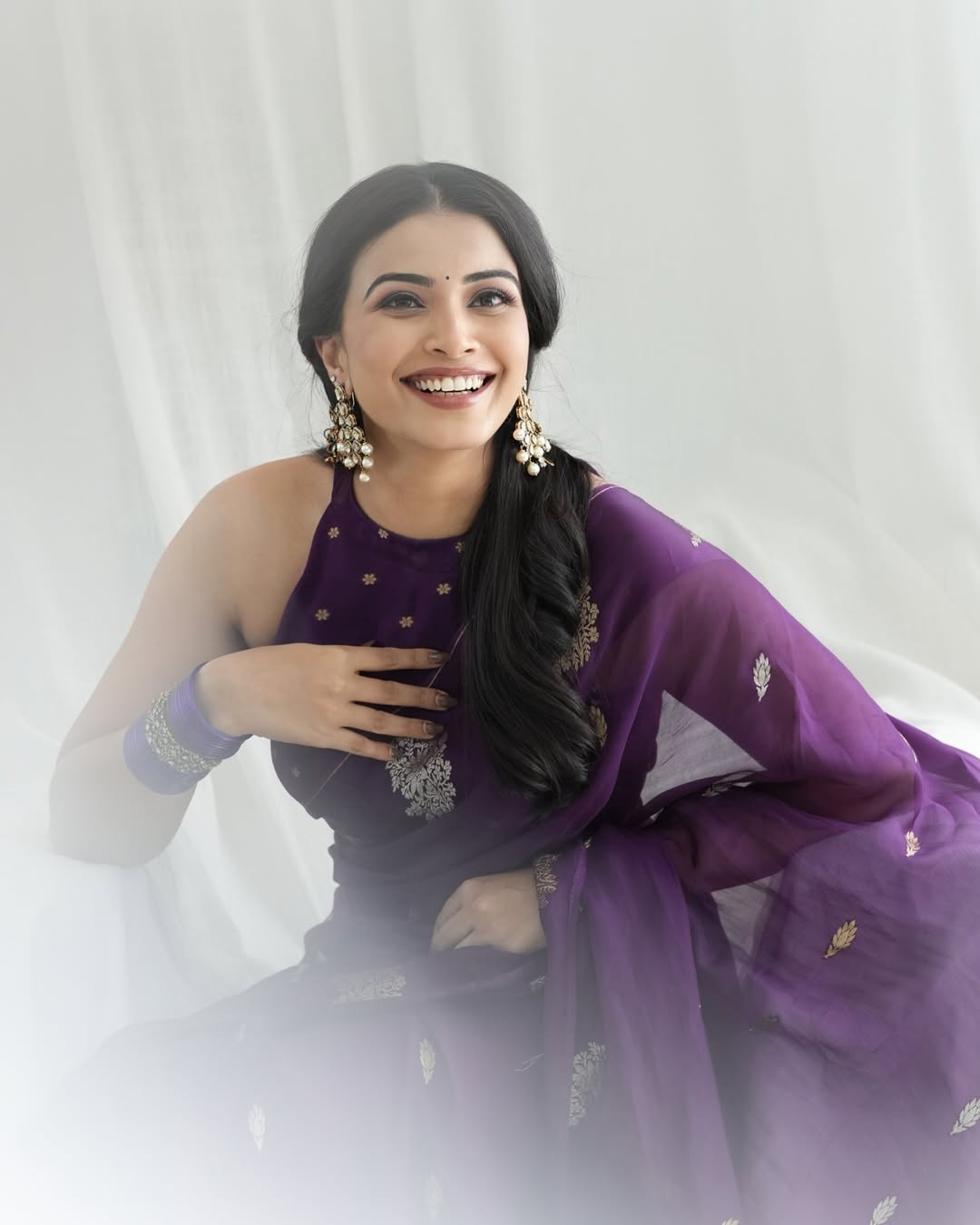 Kavya Shetty in regal purple saree elegant look