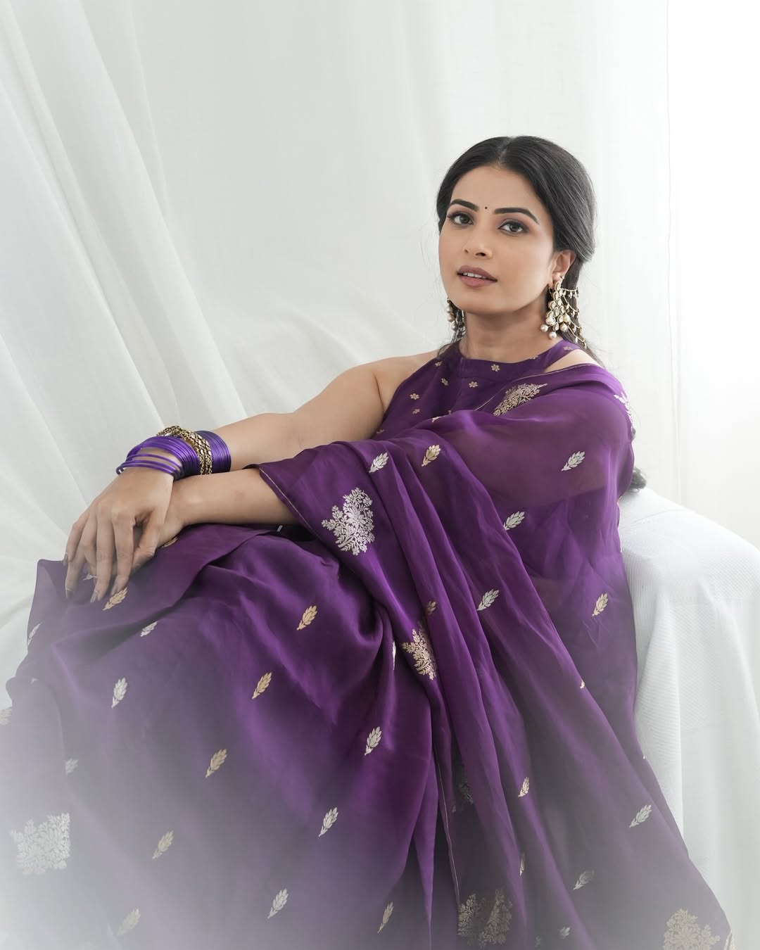 Kavya Shetty shining gracefully in purple saree style