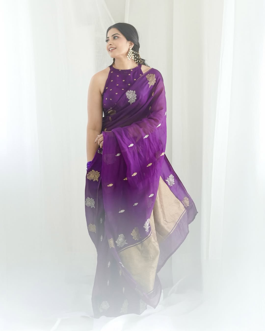Kavya Shetty glowing in purple saree royal vibe
