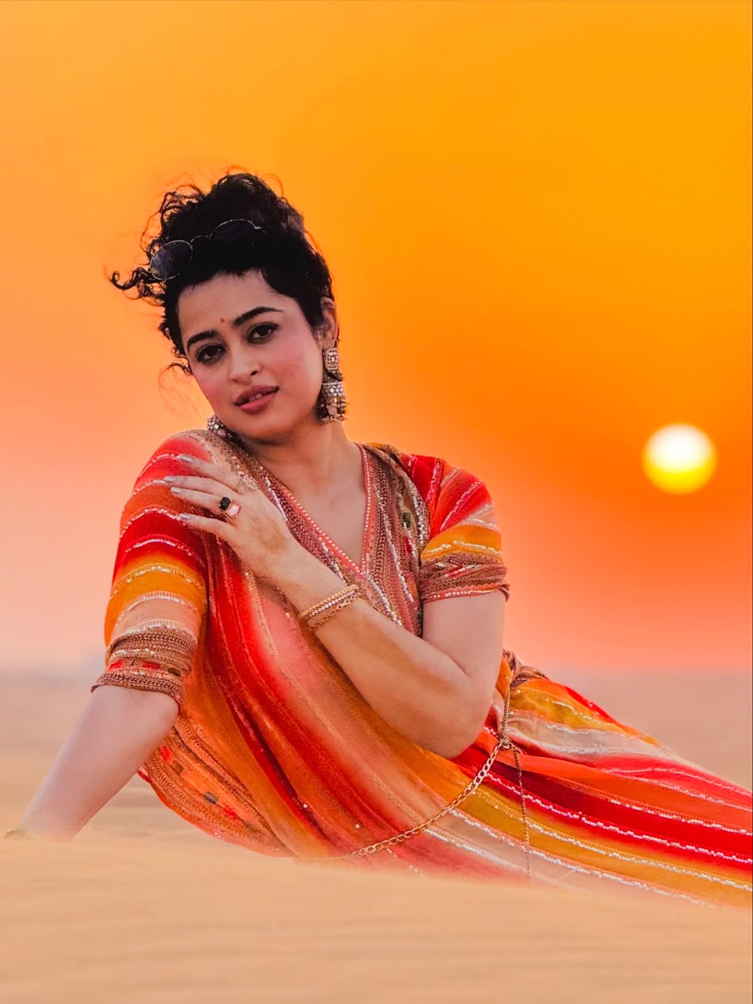 Apsara Rani blending traditional and trendy sunset inspired look