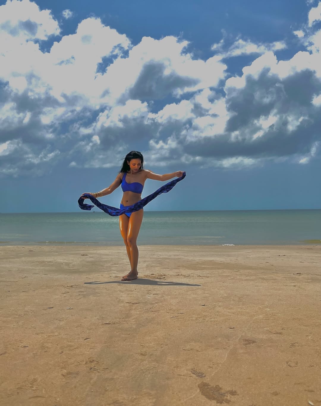 Mimi channeling ocean elegance with confident charm