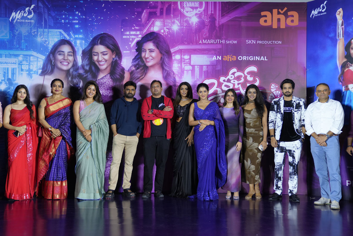 Full team with guests posing for media