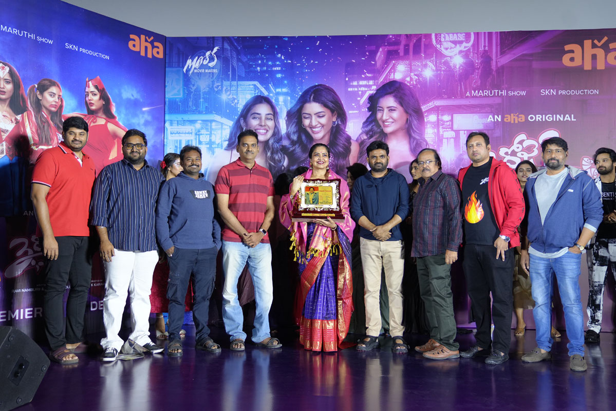 Cast producer and guest posing together