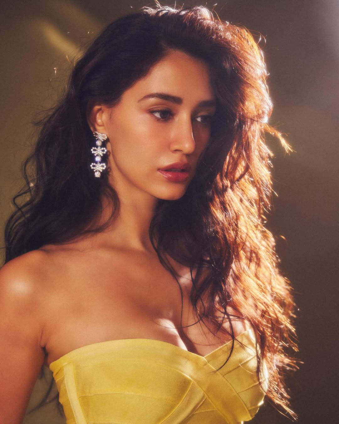 Actress Disha Patani Glamour Photos in Yellow Colour Out Fit