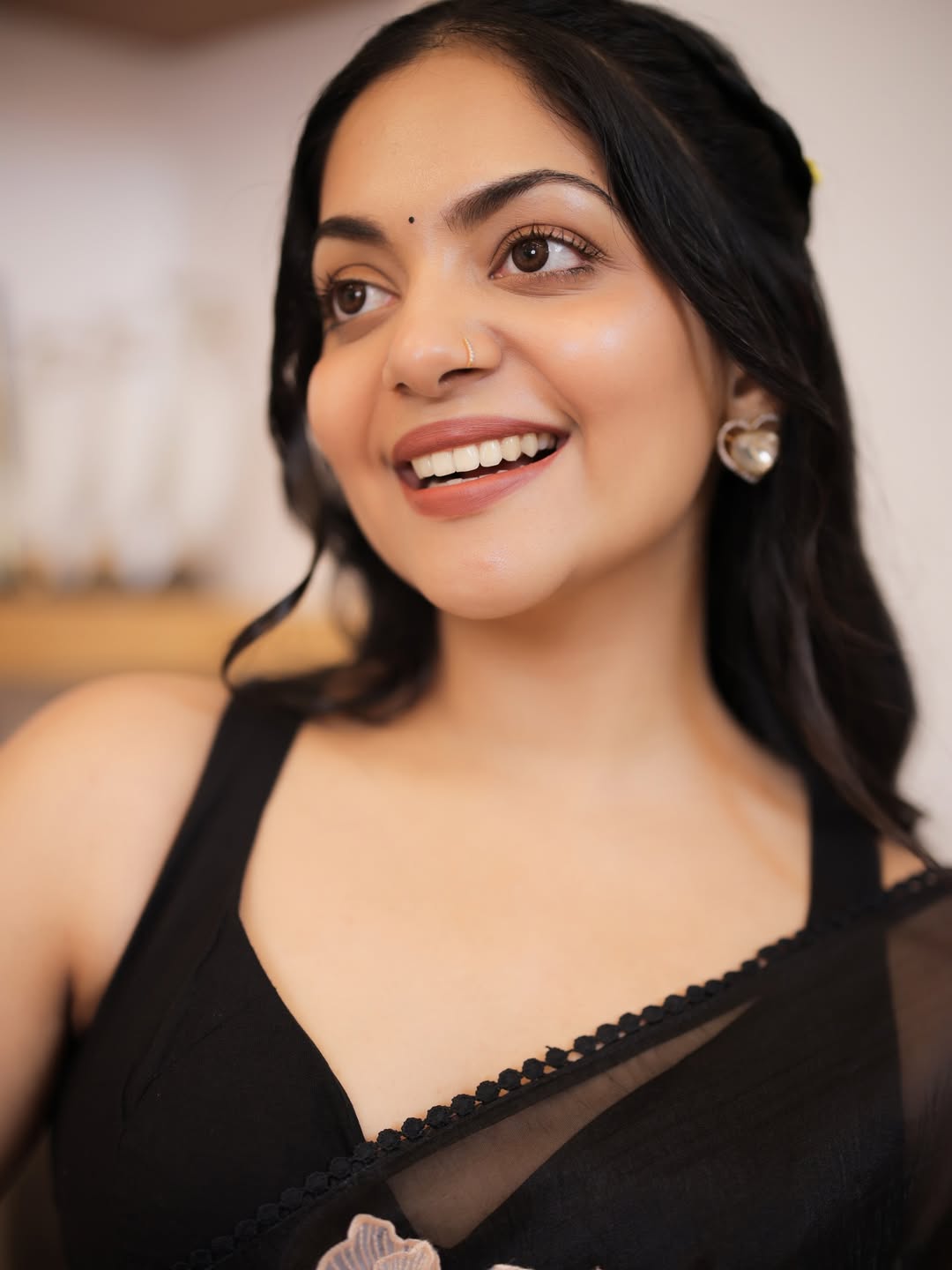 Ahaana Krishna radiates elegance in chic black saree