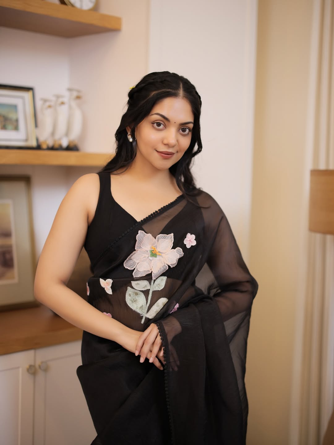 Ahaana Krishna shines in floral black saree
