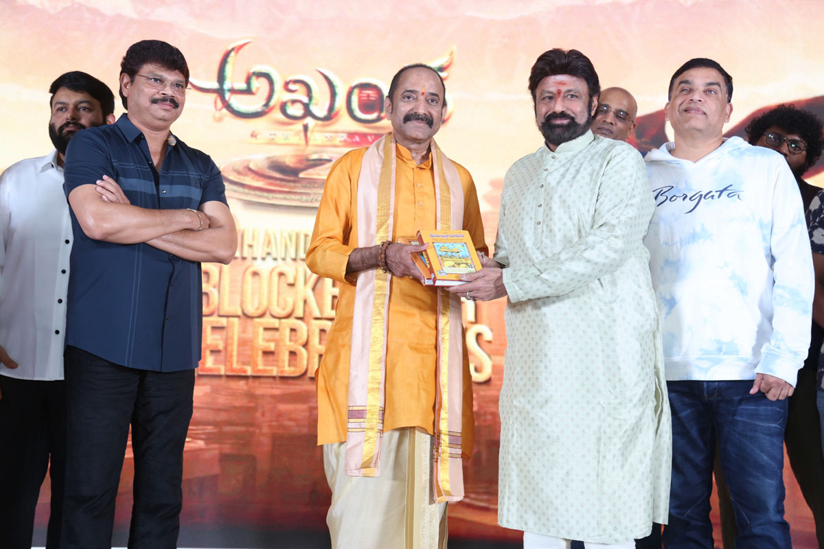 Balakrishna presenting Bhagavad Gita to LV Gangadhara Sastry