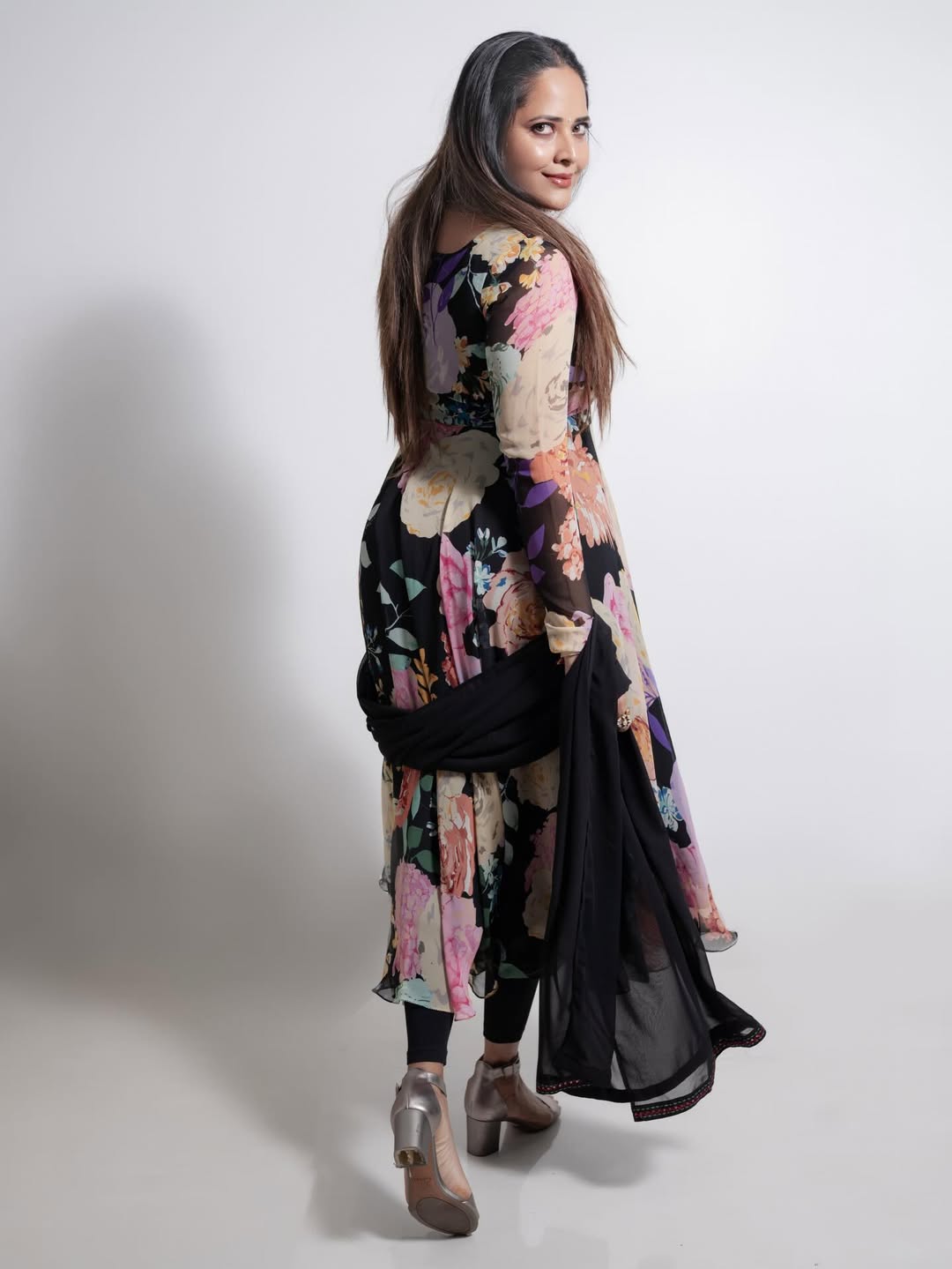 Anasuya Bharadwaj stunning floral look with killer heels