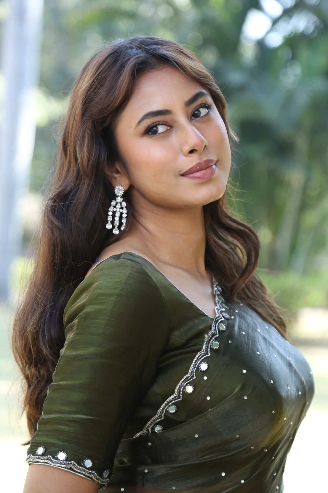 Ankita Saha wearing sparkling elegant outfit