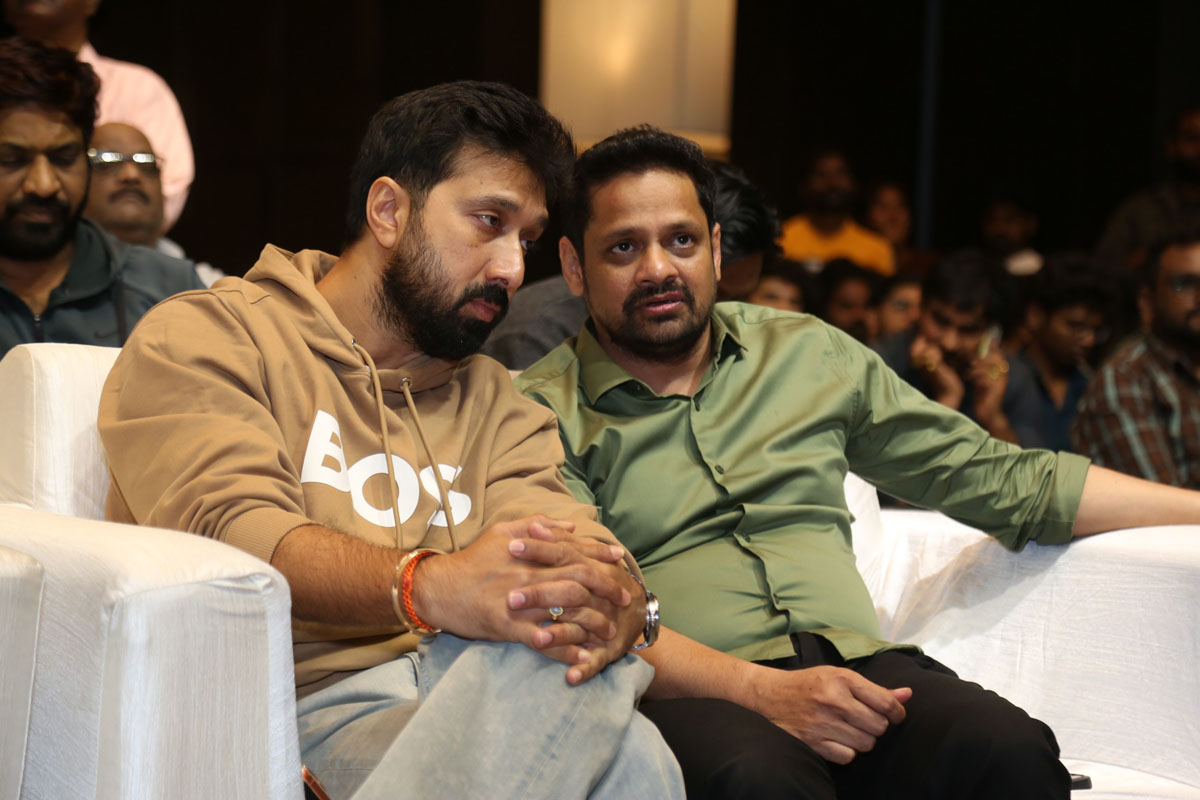 Director Bobby and Bunny Vasu talking at event