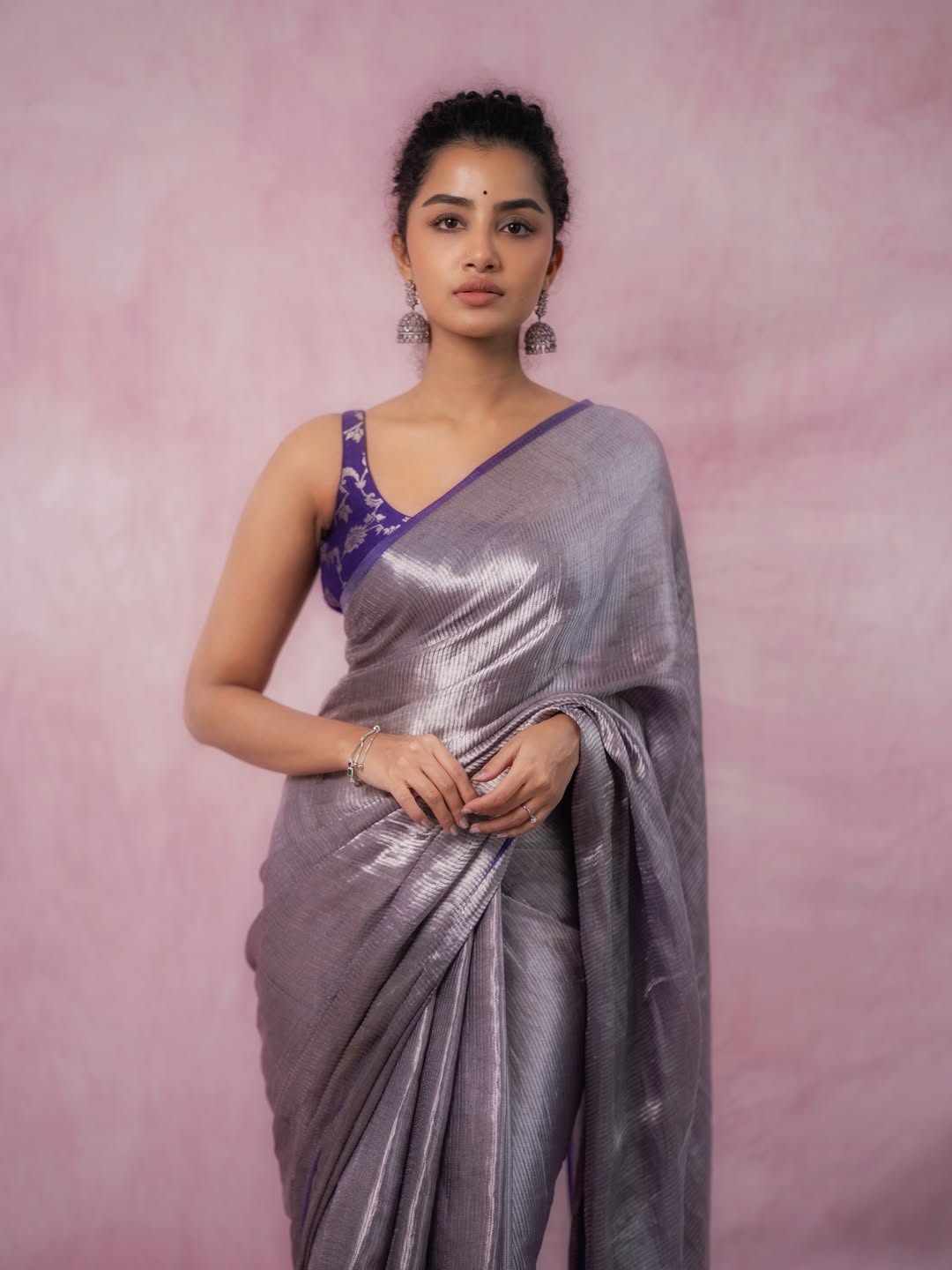 Anupama Parameswaran draped in elegant silver with mischief