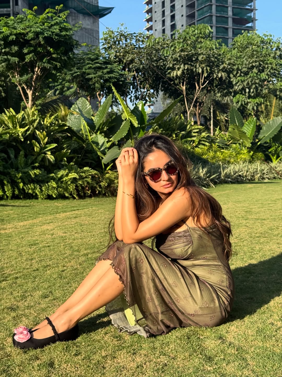 Anushka Sen wearing chic dress with stylish sunglasses