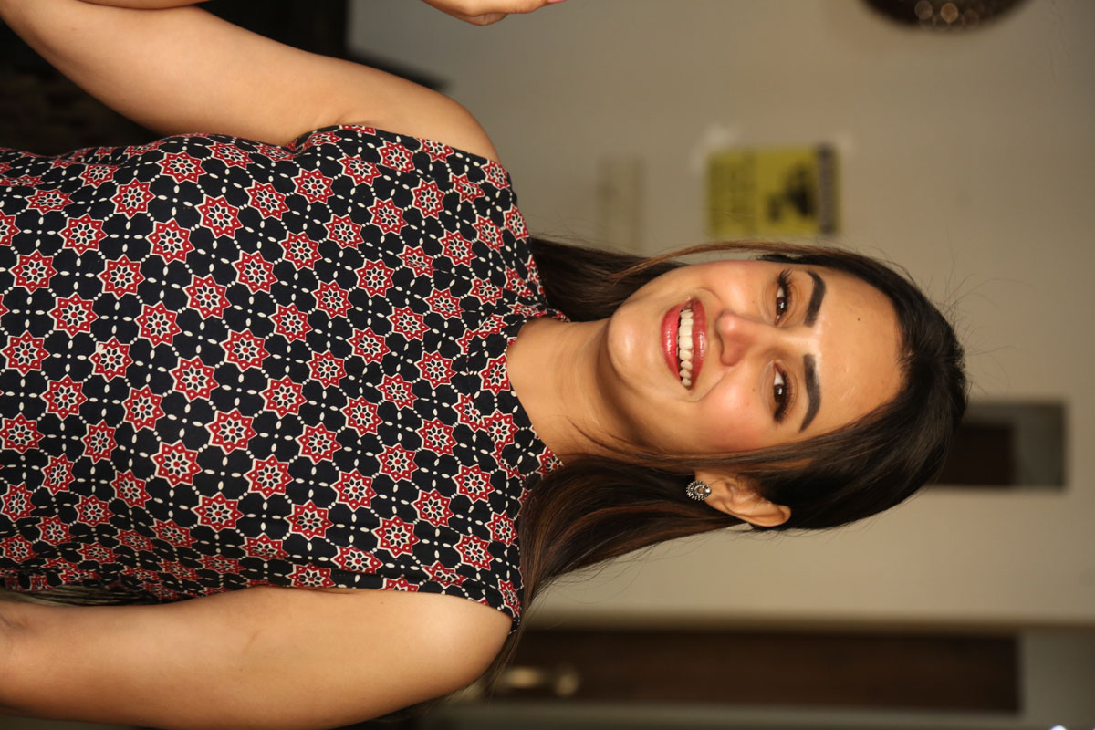 Archana Iyer showcasing vibrant dress with elegant flair