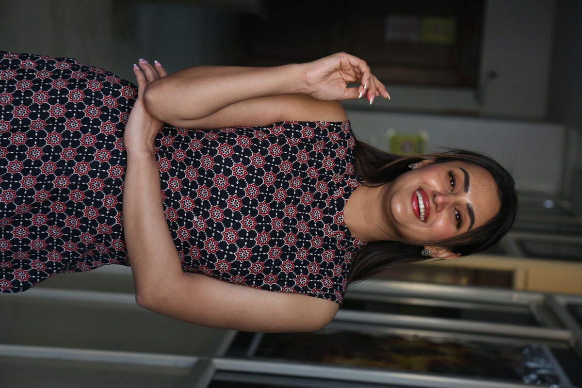 Archana Iyer radiant smile paired with vibrant fashion