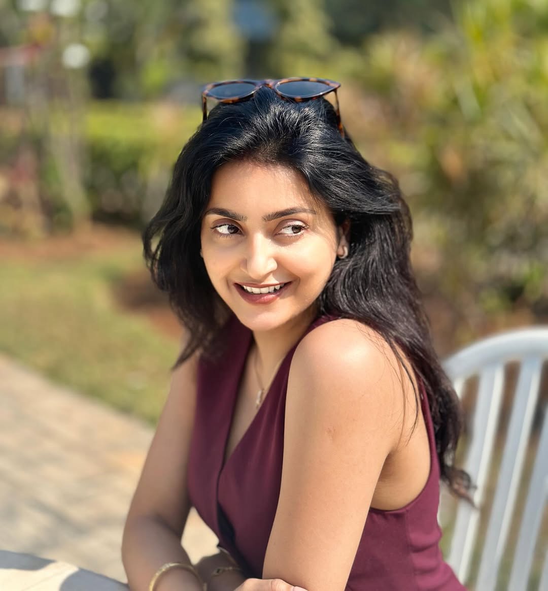 Avantika Mishra stylish maroon outfit with confident smile