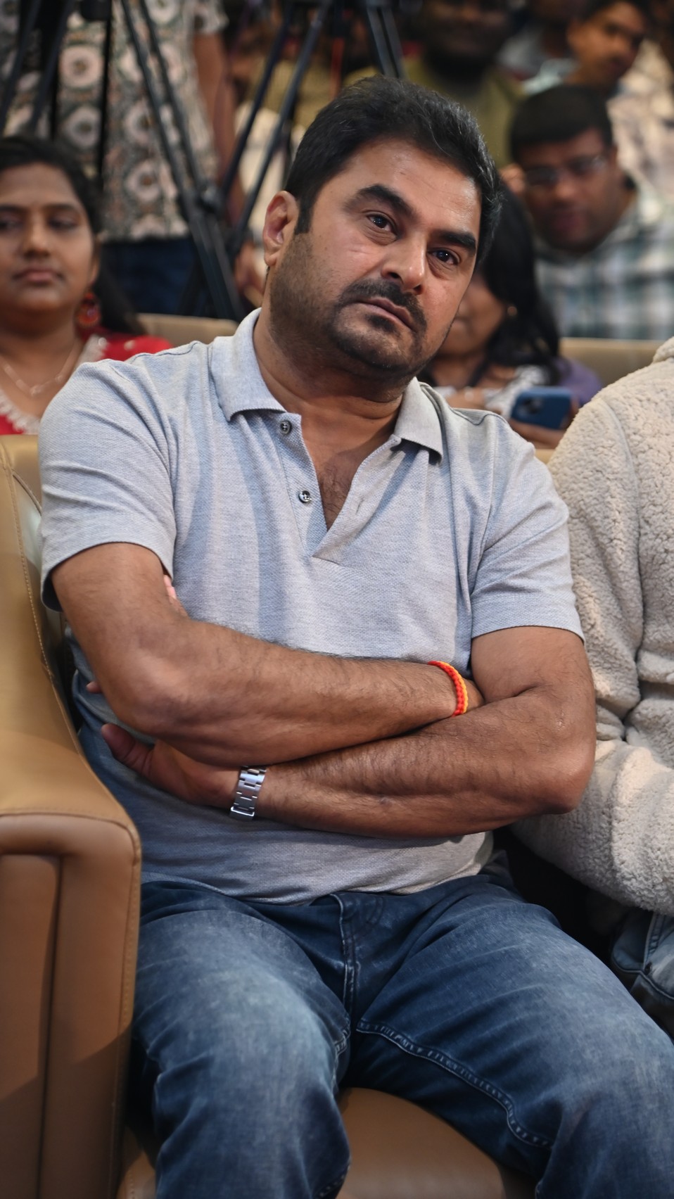 Producer Sudhakar Cherukuri seated at press meet