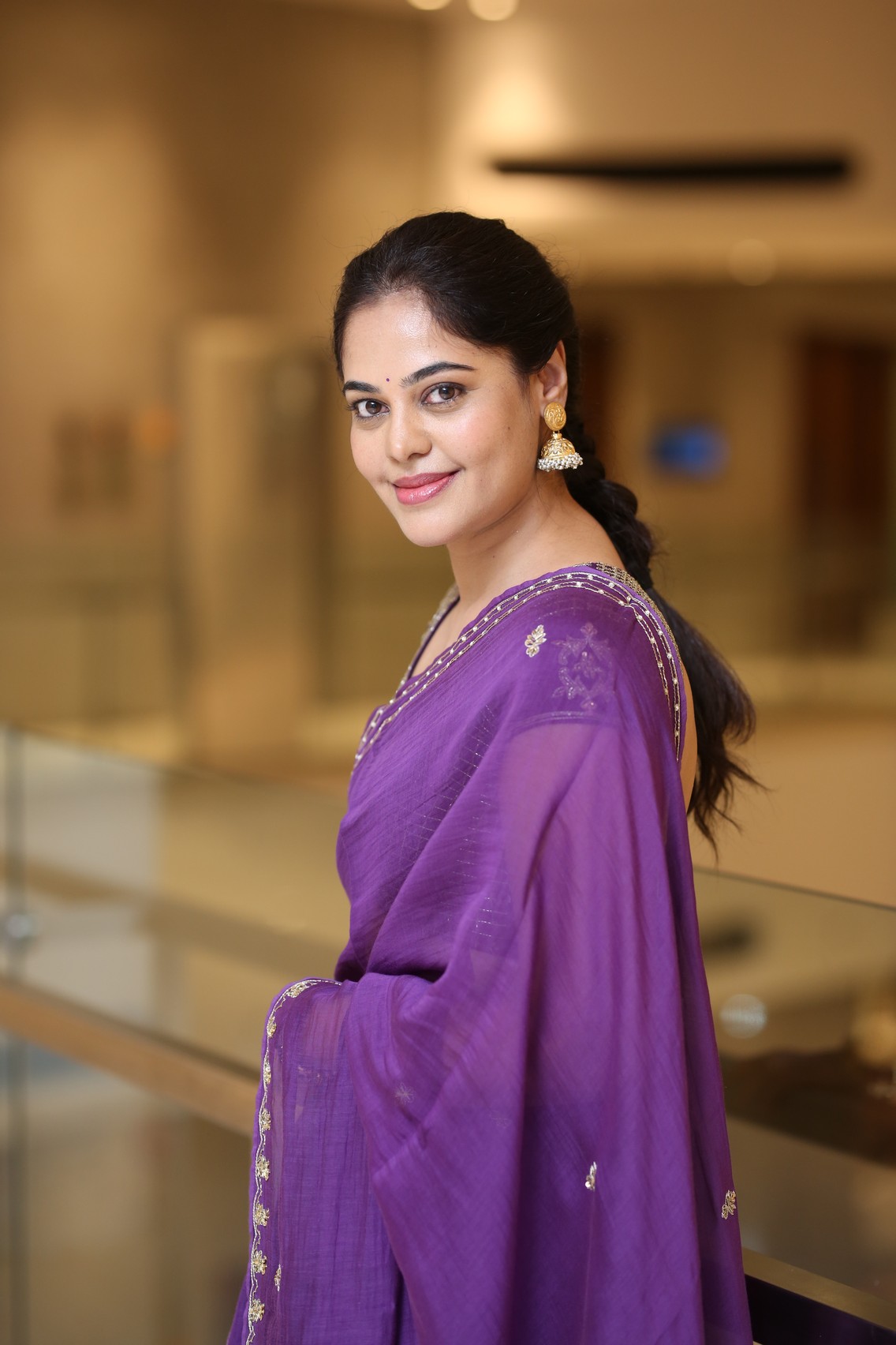 Bindu Madhavi exuding grace in traditional purple drape