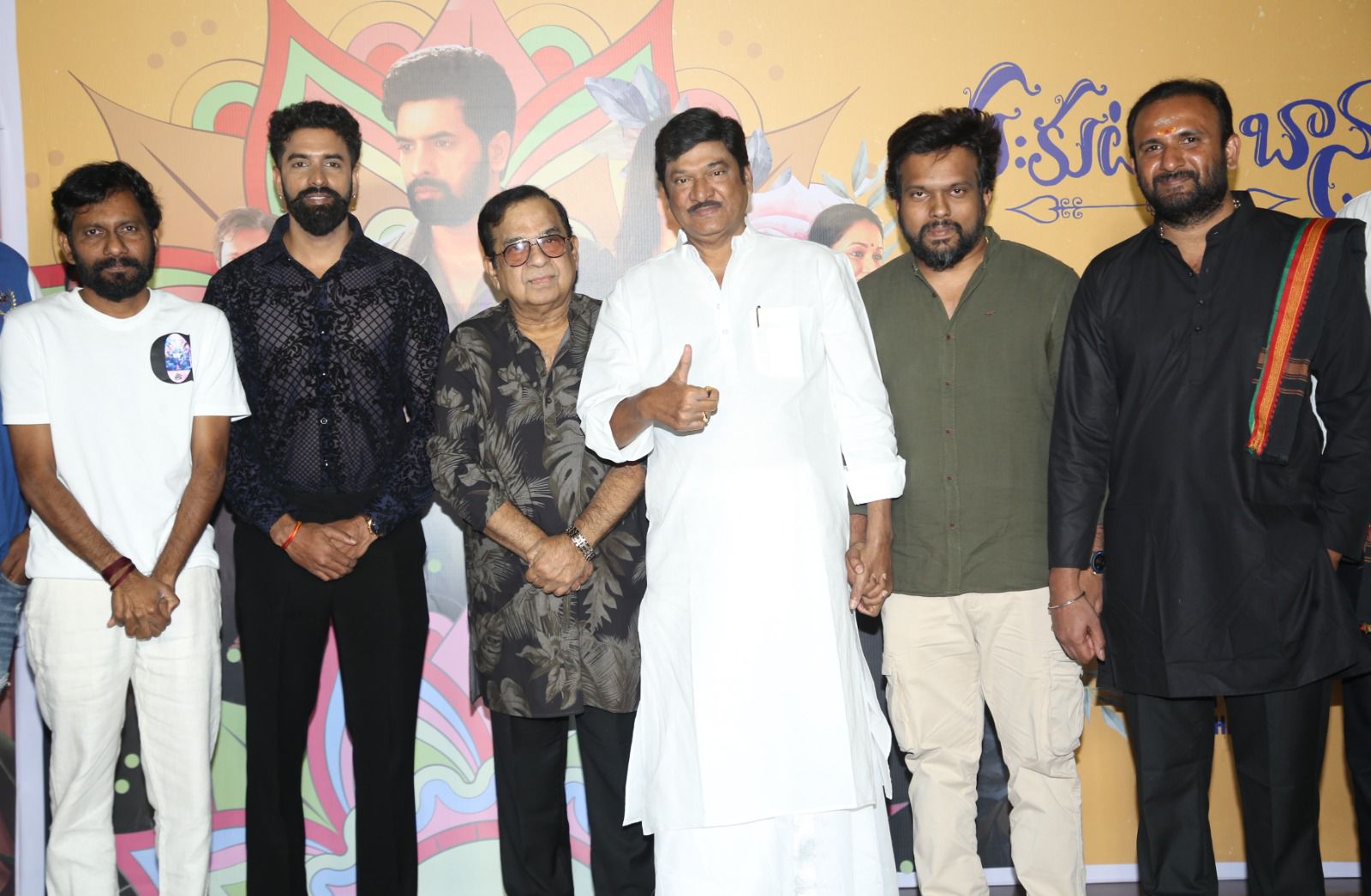 Rajendra Prasad seated and smiling at event
