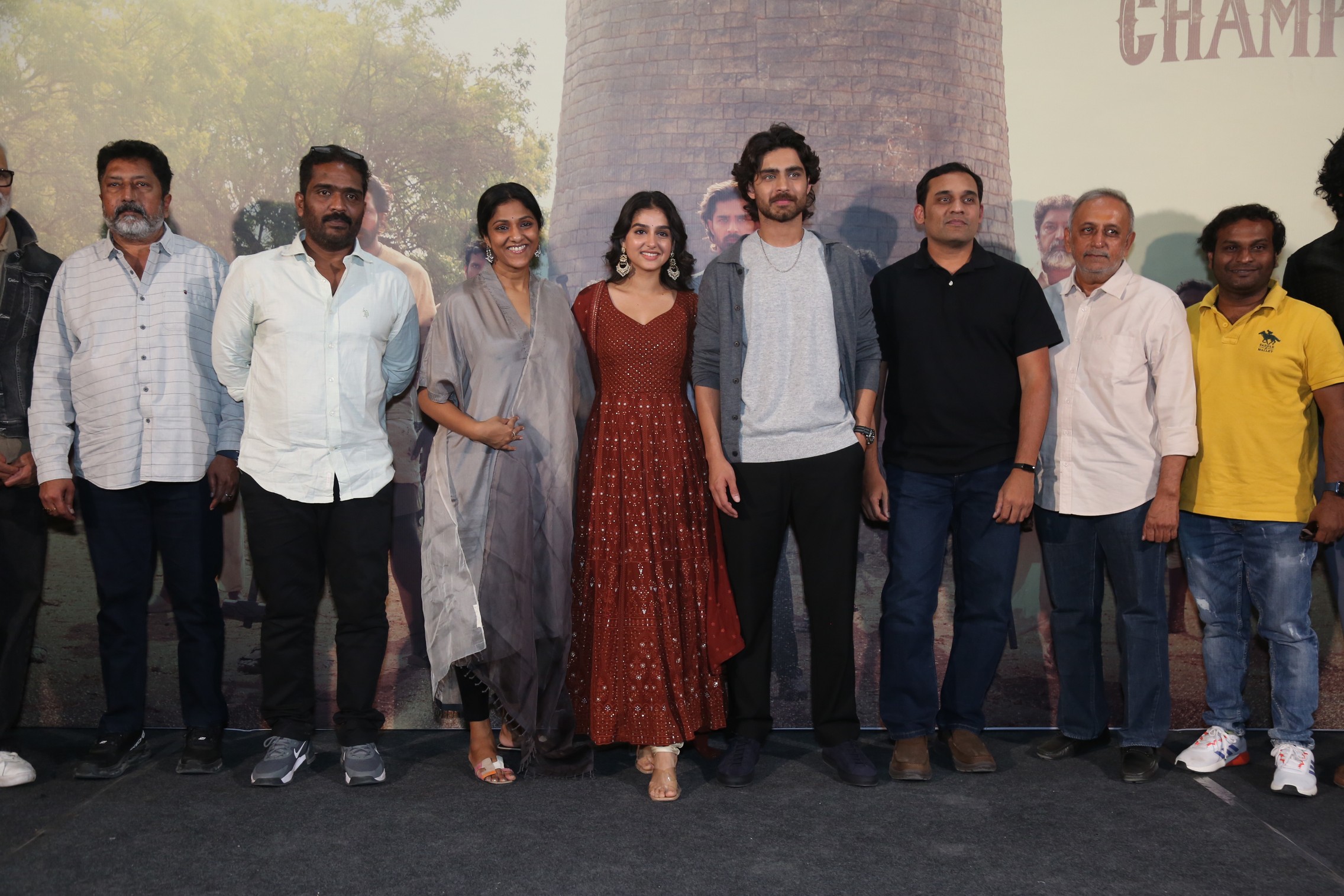 Champion film team posing at success meet