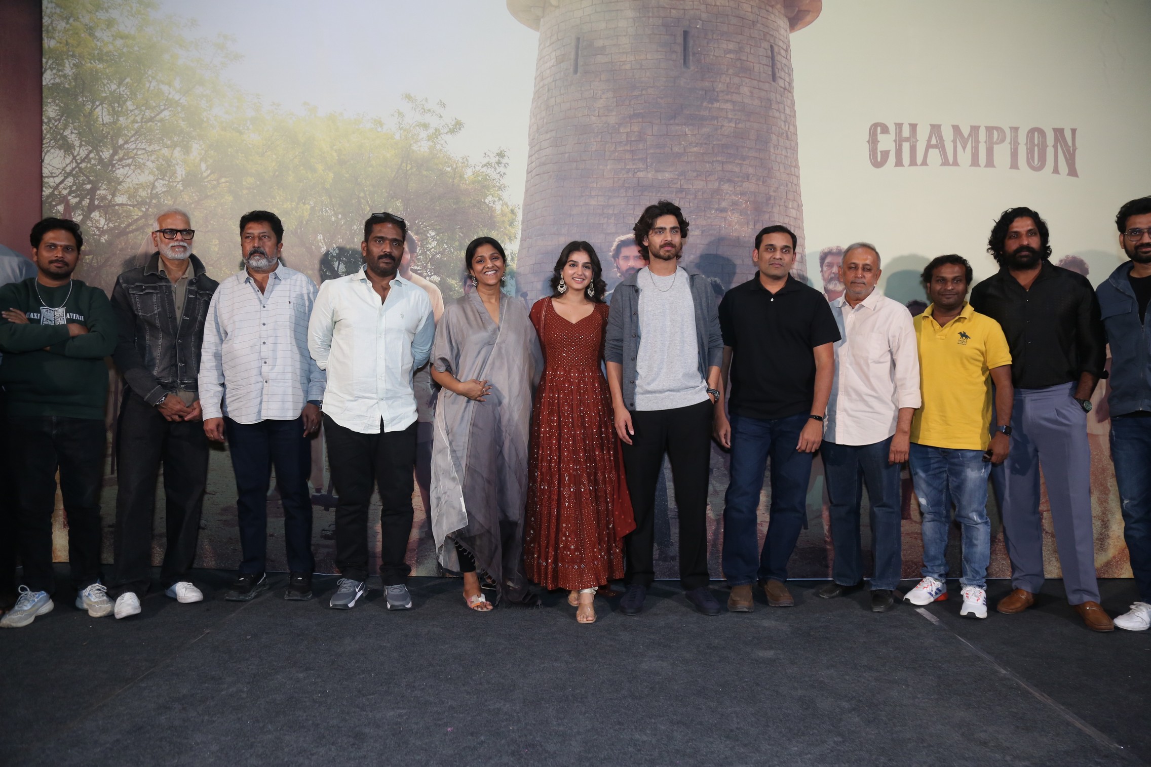 Champion cast and crew group moment