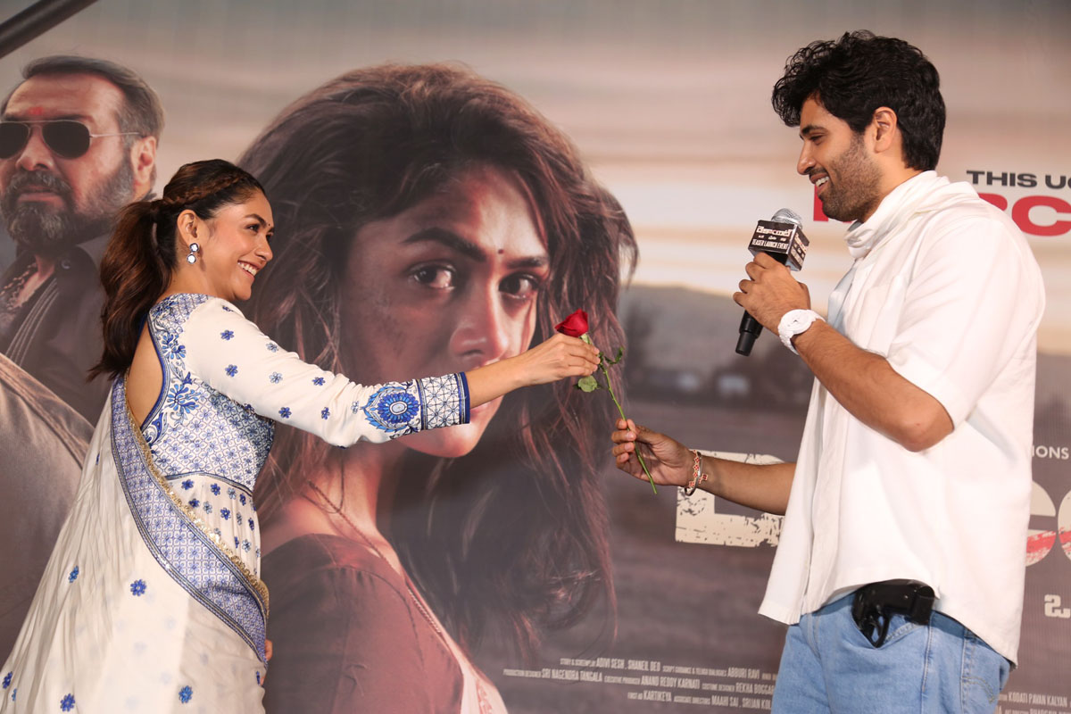 Mrunal Thakur gifting rose to Adivi Sesh