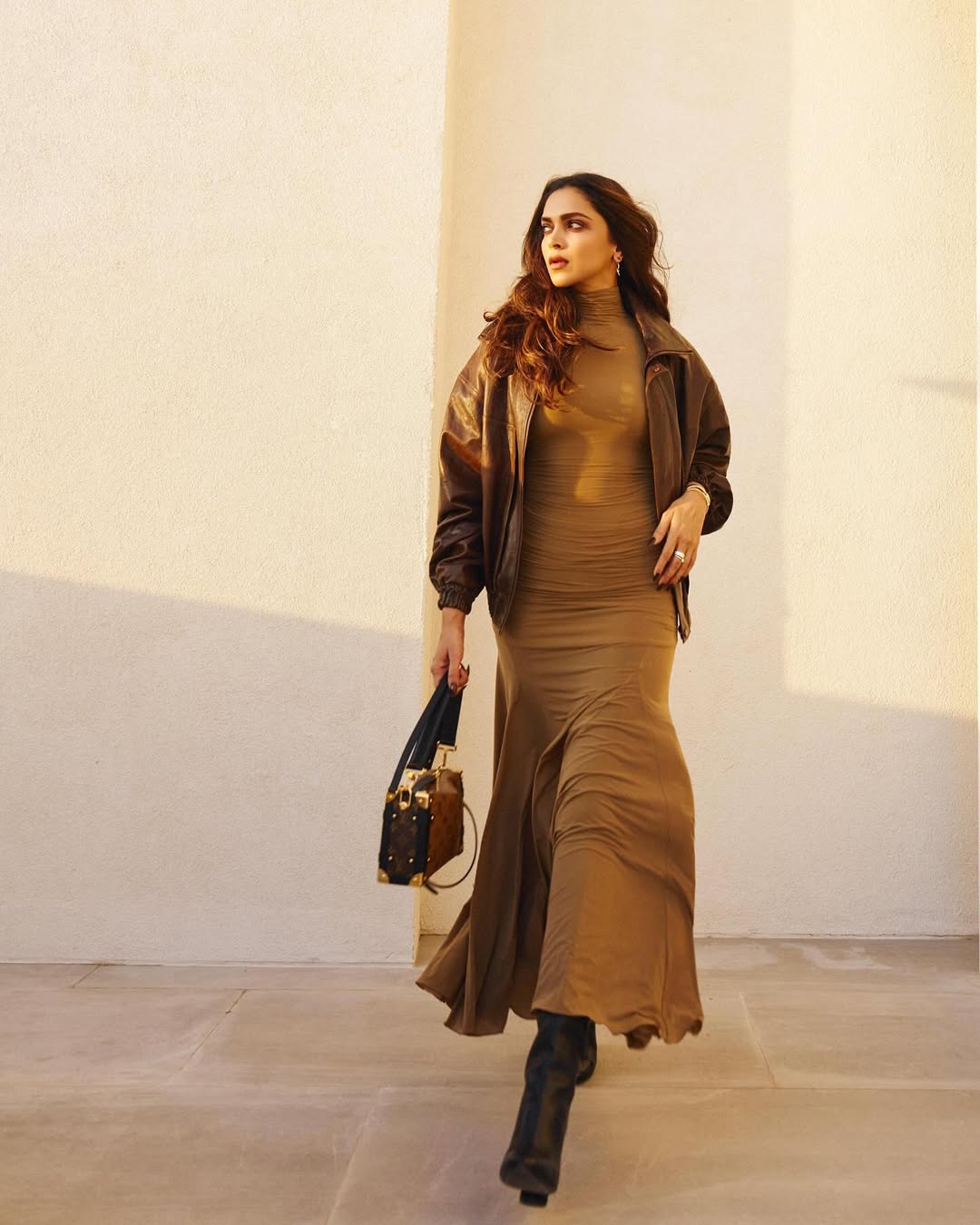 Deepika Padukone blending leather jacket with glamorous gown