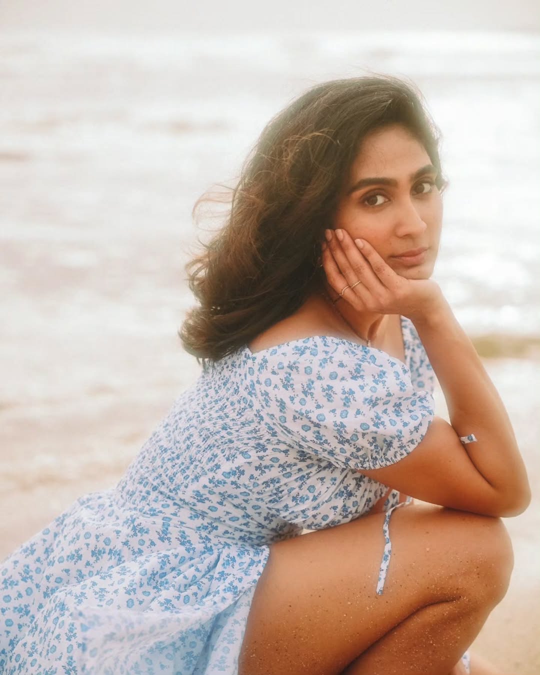 Deepti Sati in blue dress with serene gaze