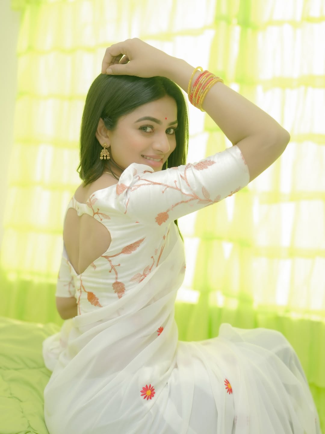 Delna Davis radiating grace in simple floral saree