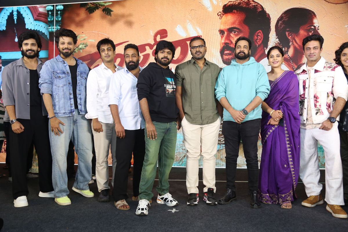 Dhandoraa cast posing together during pre-release event