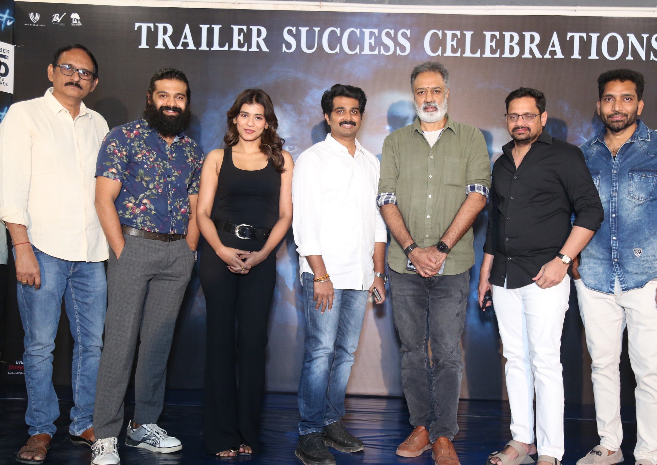 Srinivas Manne with Thrigun Hebah Patel and producers posing for media