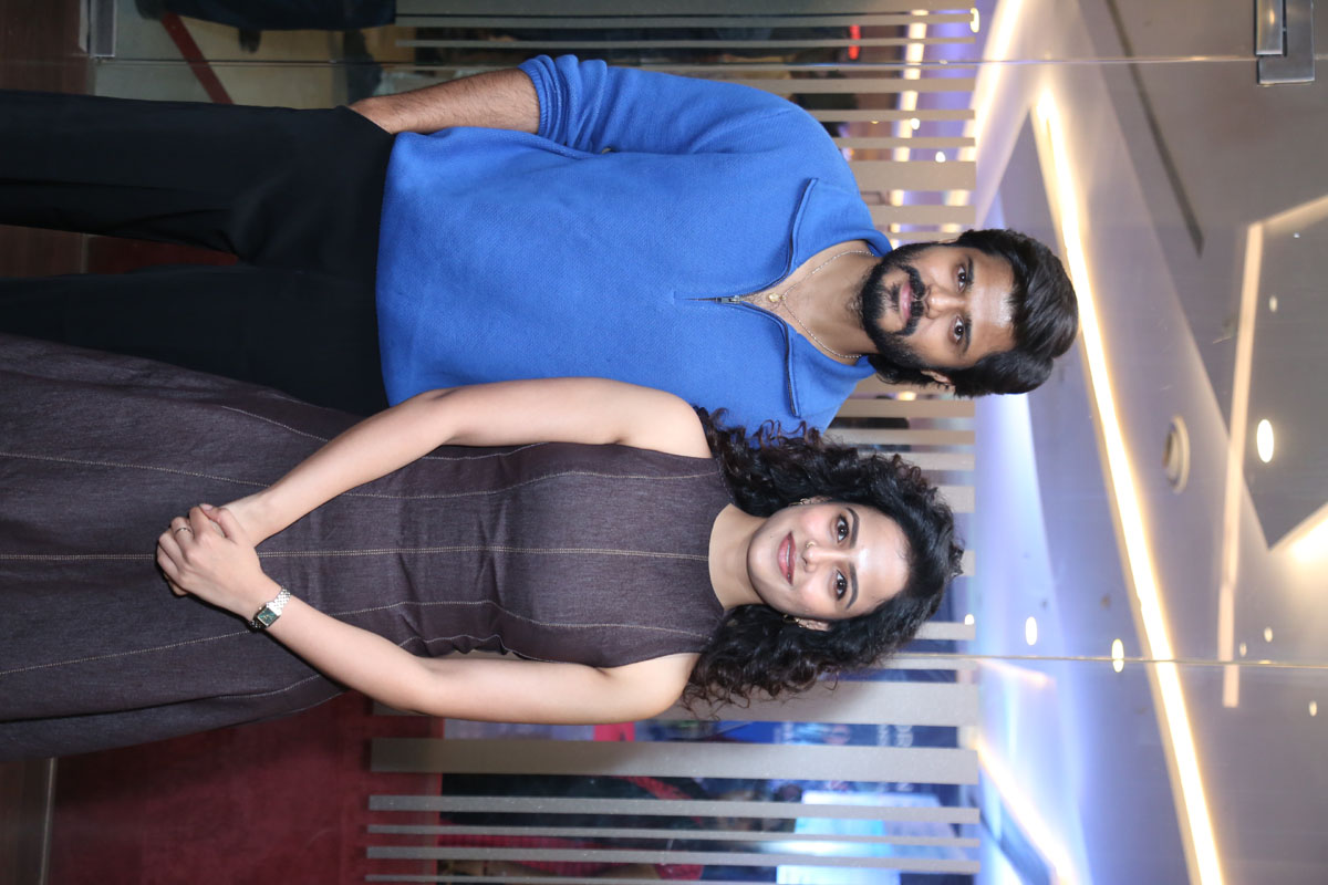 Anand Deverakonda Vaishnavi Chaitanya posing for media
