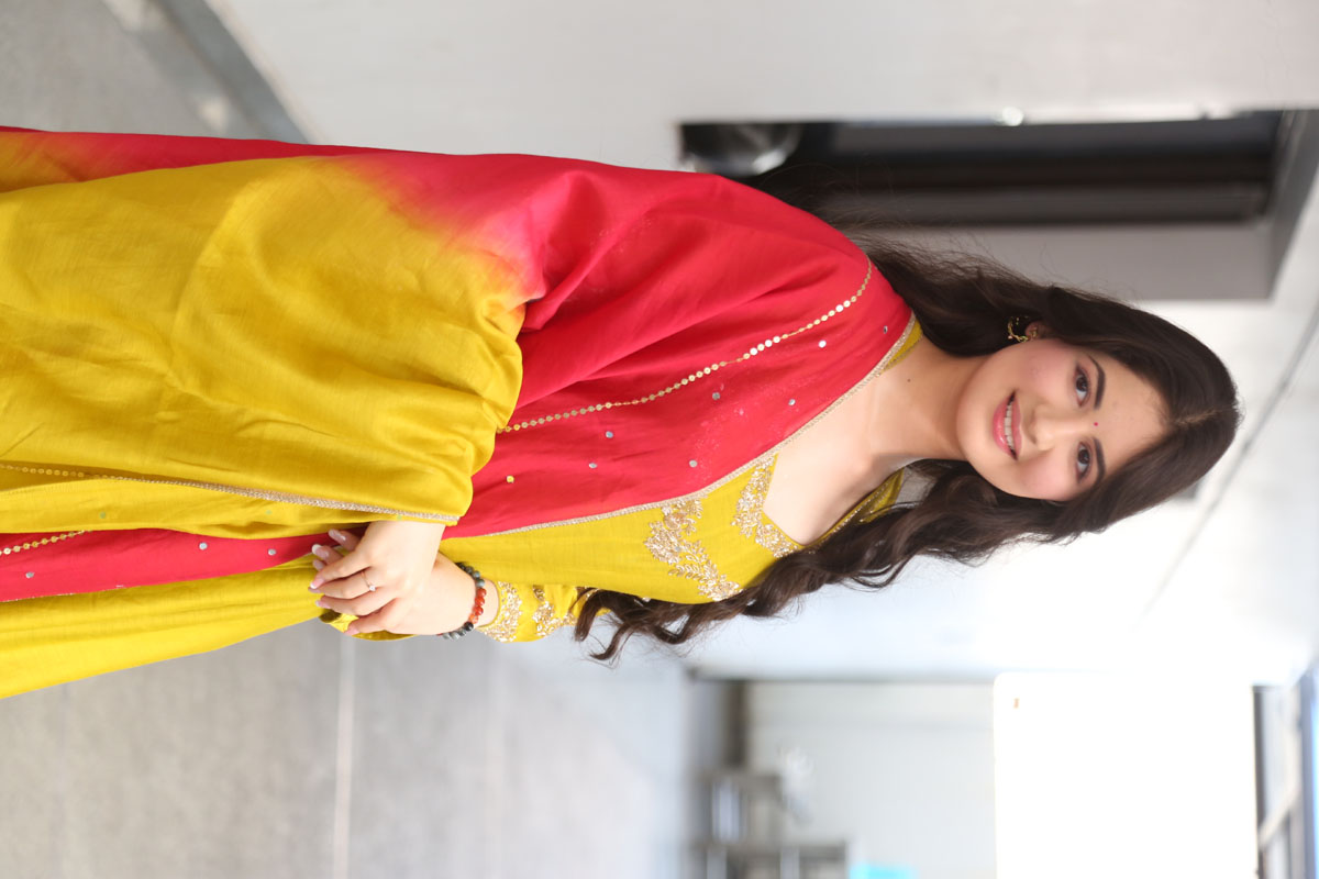 Harshaali Malhotra in vibrant yellow and red elegance