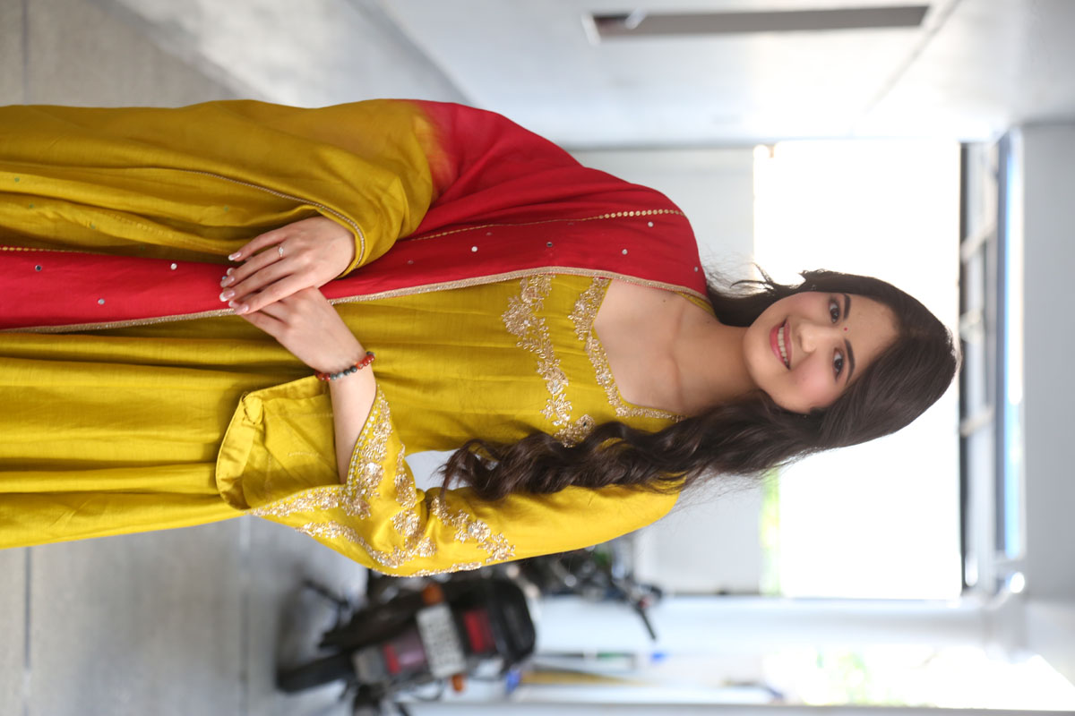 Harshaali Malhotra glowing in yellow red festive style