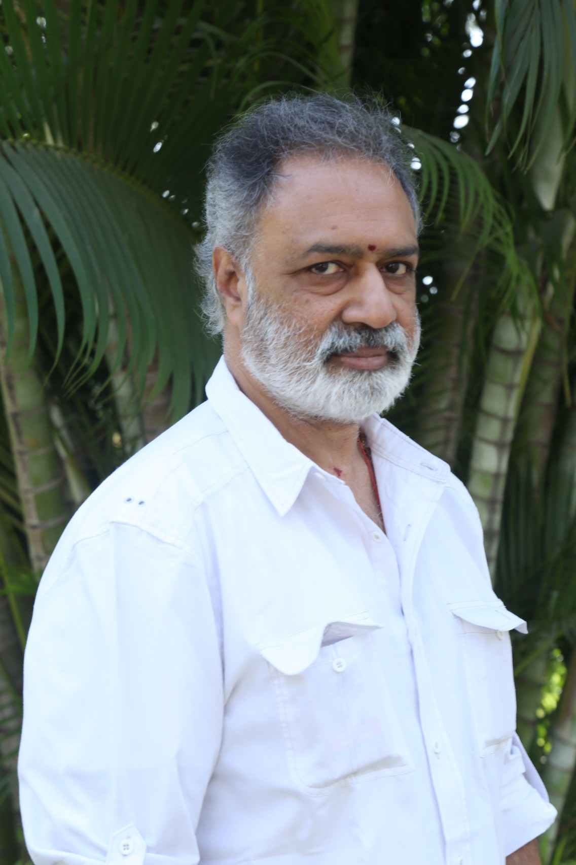 K. L. Damodar Prasad smart formal look portrait