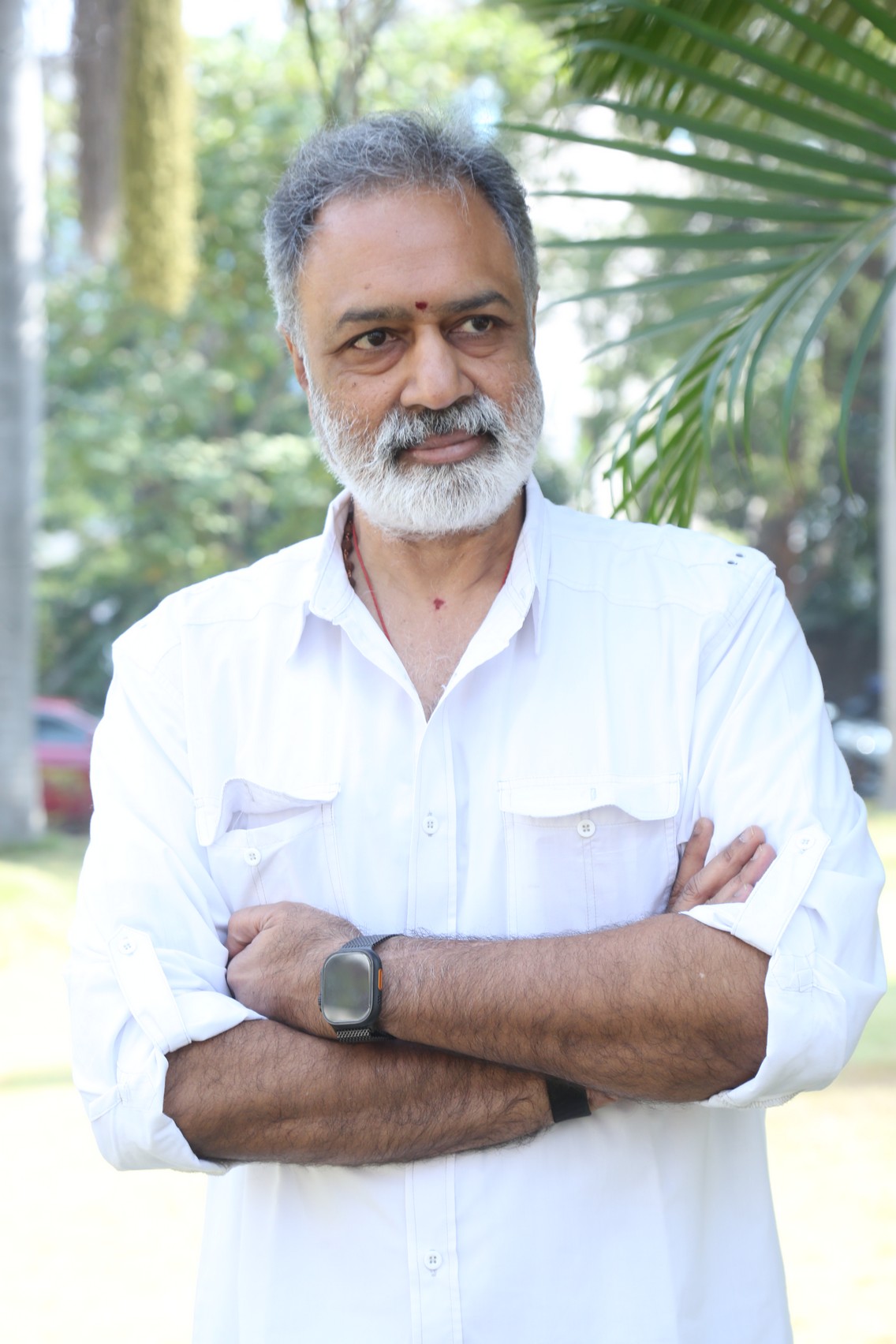 K. L. Damodar Prasad wearing watch stylish pose