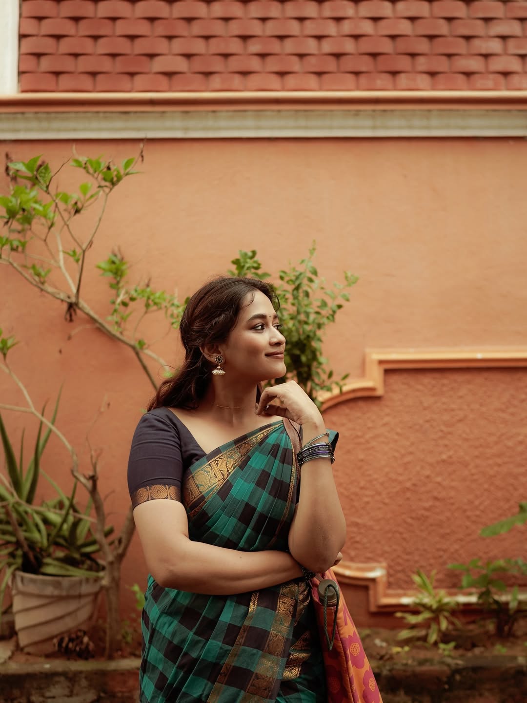 Kaavya Arivumani elegant traditional look with mischievous charm