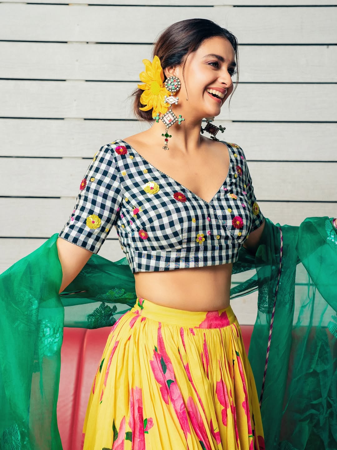 Keerthy Suresh in checkered florals with yellow charm
