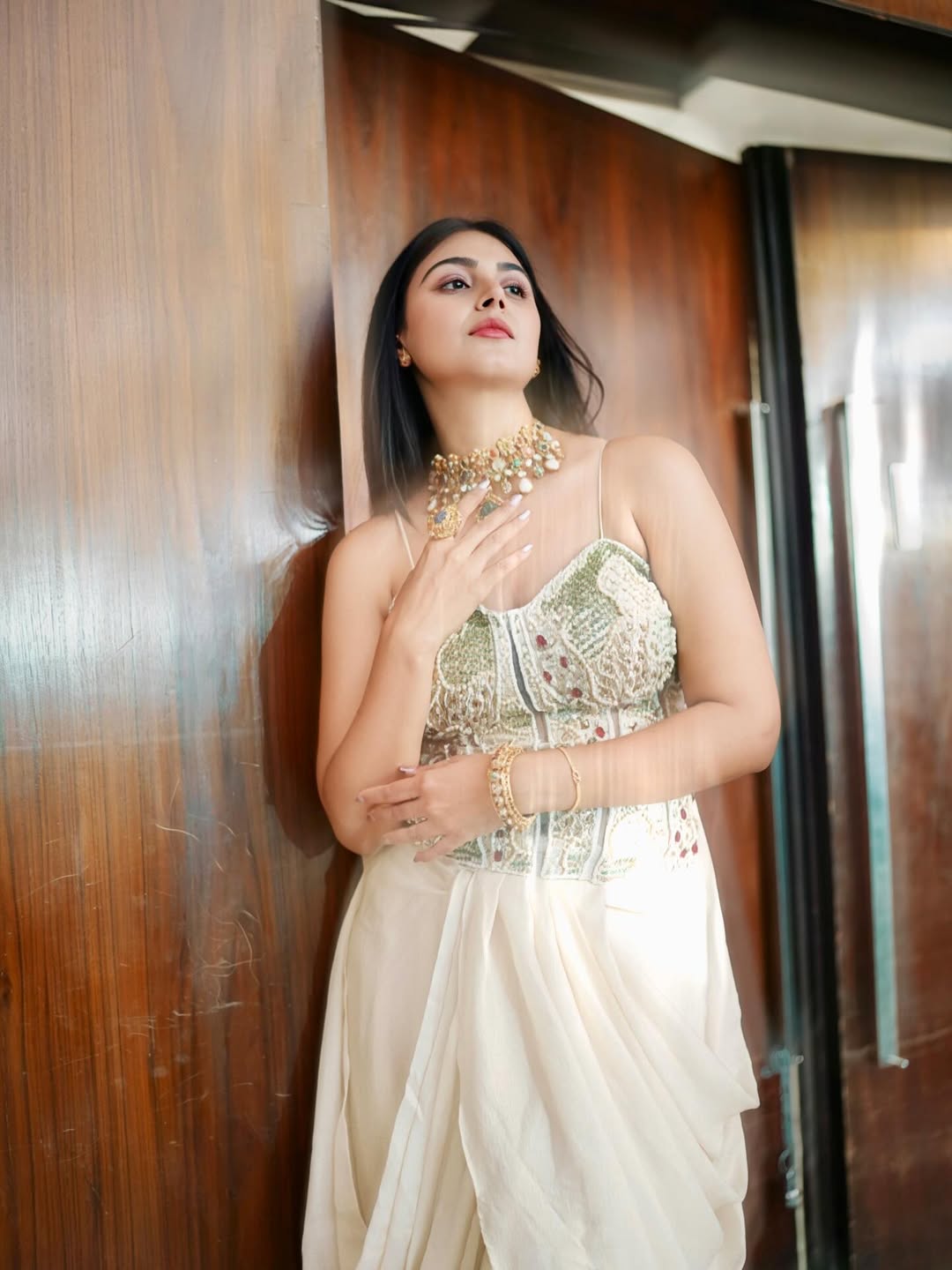 Monal Gajjar posing in elegant attire with confident attitude