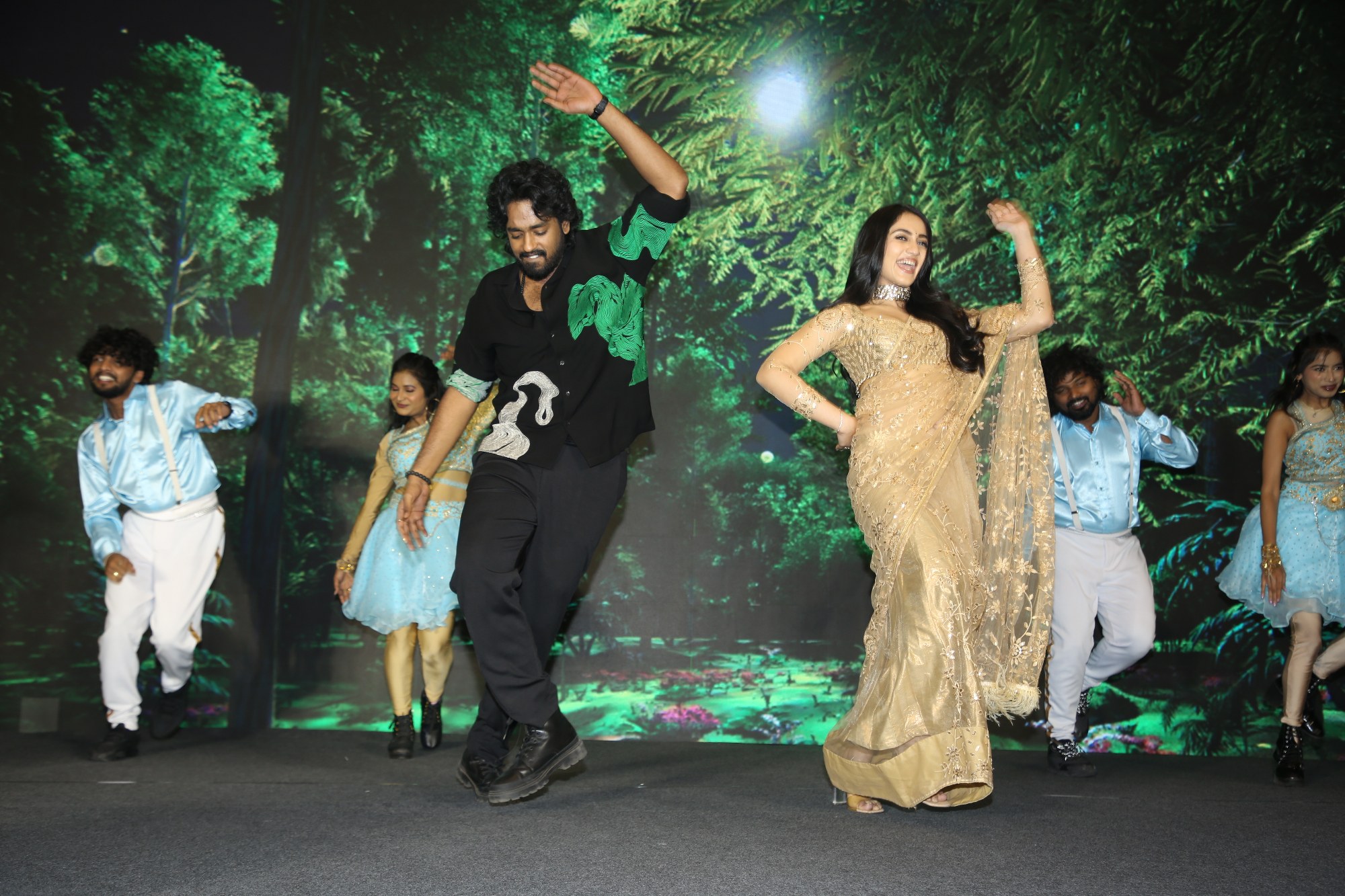 Roshan Kanakala Sakshi Mhadolkar dancing on stage