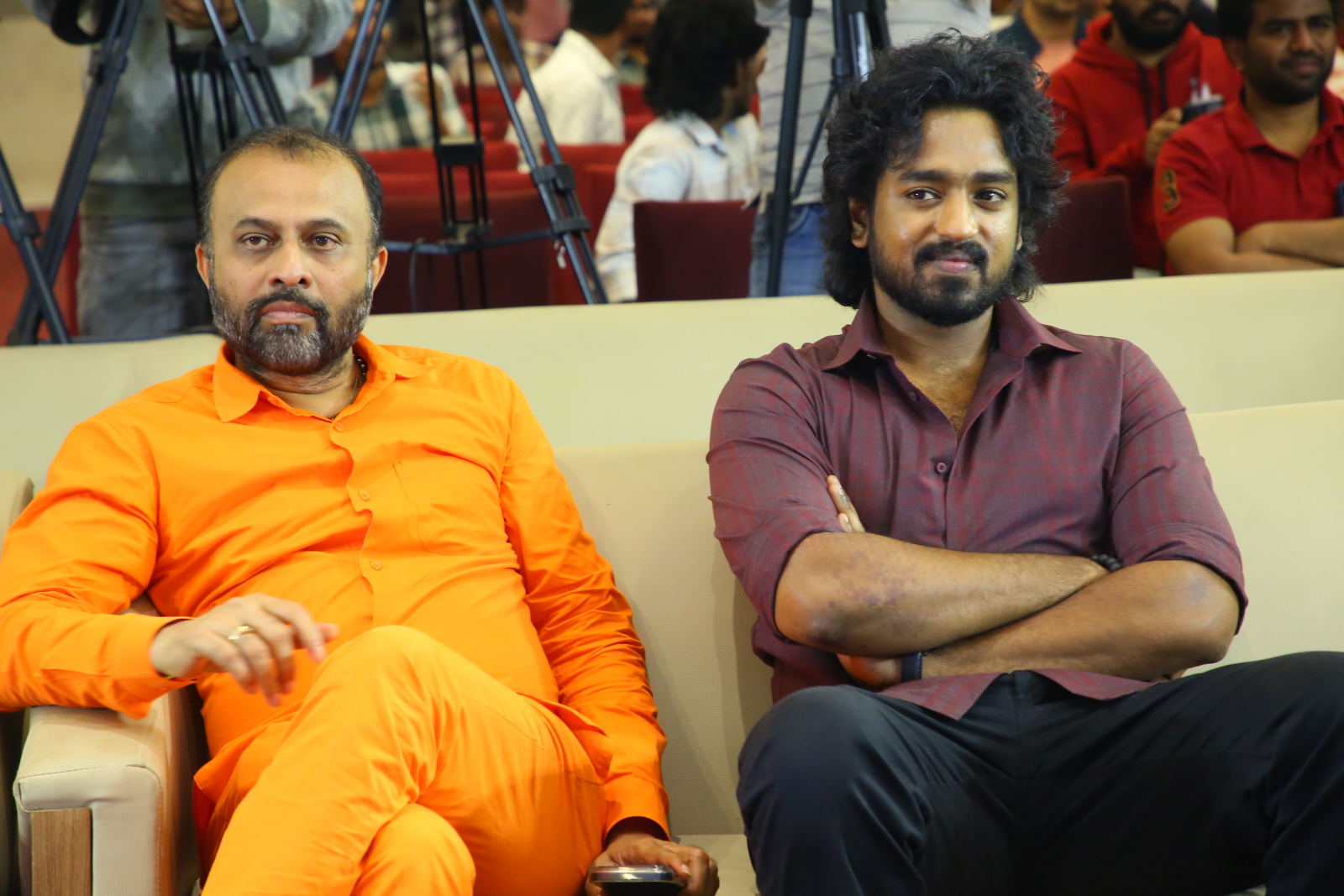 TG Vishwa Prasad Roshan Kanakala seated