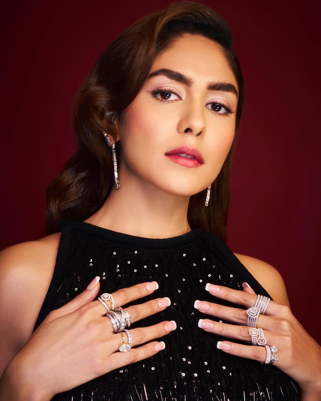 Mrunal Thakur glowing in elegant black dress with sparkle