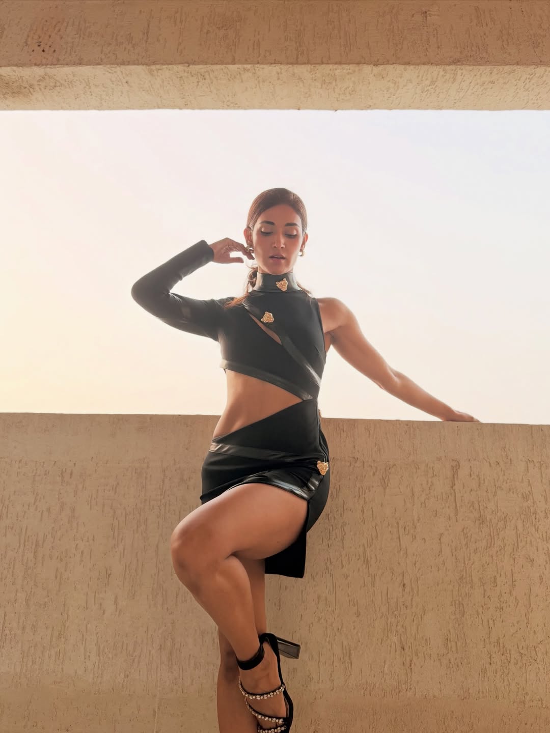 Mukti Mohan in black leather look with bold charm